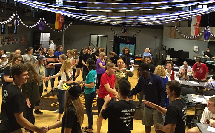 Students dance to the "Fliegerlied" at the BW Oktoberfest.