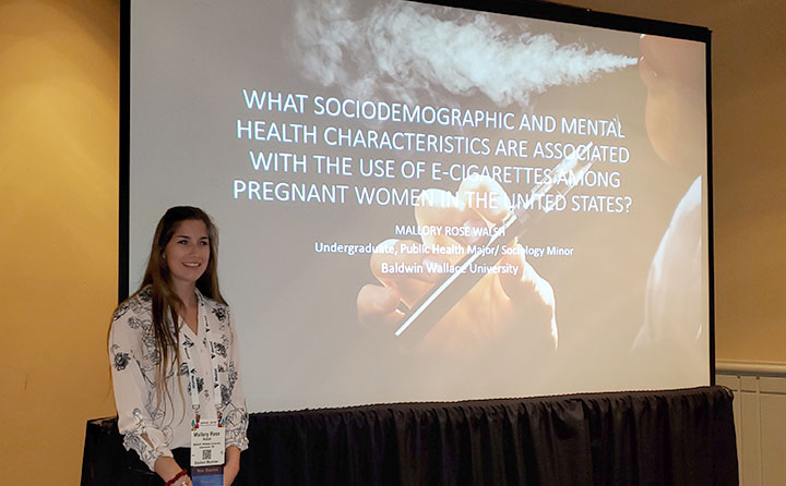 Photo of Mallory Walsh presenting at the American Public Health Association (APHA) Annual Meeting and Expo.