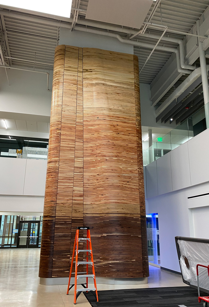 The impressive elevator shaft on BW's Austin E. Knowlton Center is wrapped in wood panels reclaimed from trees that were removed as part of the project.