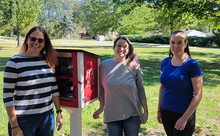 BW mathematics faculty, Dr. Kate Lane, Dr. Laura Croyle and Dr. Melissa Dennison, at the BW Math Club's Little Free Library