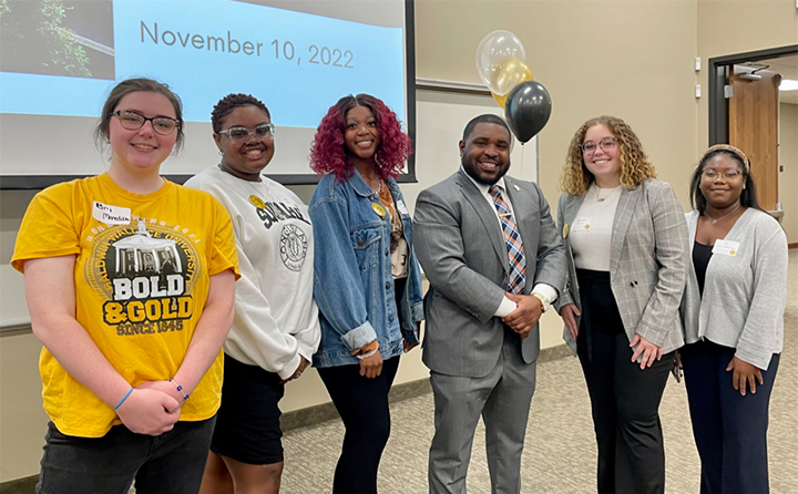 BW first-gen students pose with First-Gen Day keynote speaker, Cleveland City Council representative Richard Starr ‘19, MBA ’21, third from right.