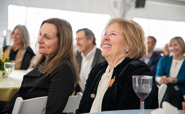 Boyer and Carmel elicited a number of laughs from the crowd, including Carmel’s riff that the business school name was far above and beyond “the 11x17 plaque” he and Boyer expected upon their retireme