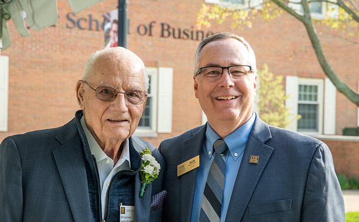 President Bob Helmer, pictured (right) with Bill Carmel (left) told the gathering, “Whenever I was with Bill and George I stood a little taller and wanted to be a little better because of their exampl