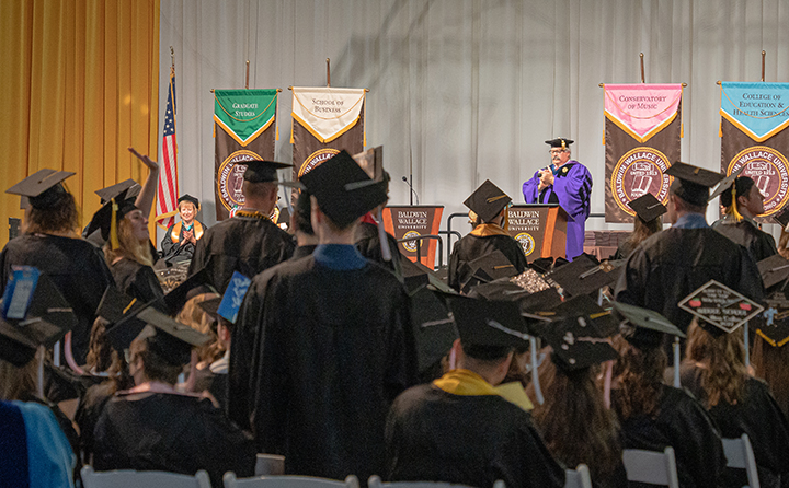 BW Provost Stephen Stahl asks groups of high-achieving students to stand and be recognized at the May 2022 Commencement.