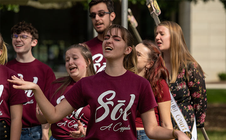 Photo of BW Student Singing in Sol A Capella Group