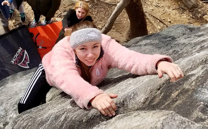 Image of Student Rock Climbing