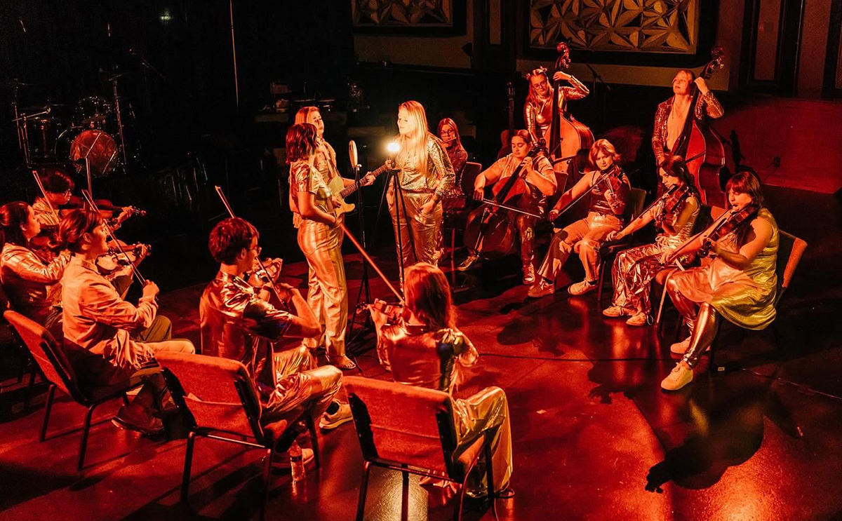 The Accidentals and Kaboom Collective during a video recording session