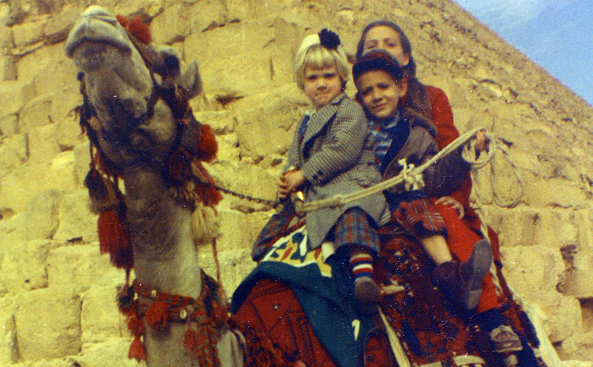 The three eldest Bonds siblings atop a camel in Egypt