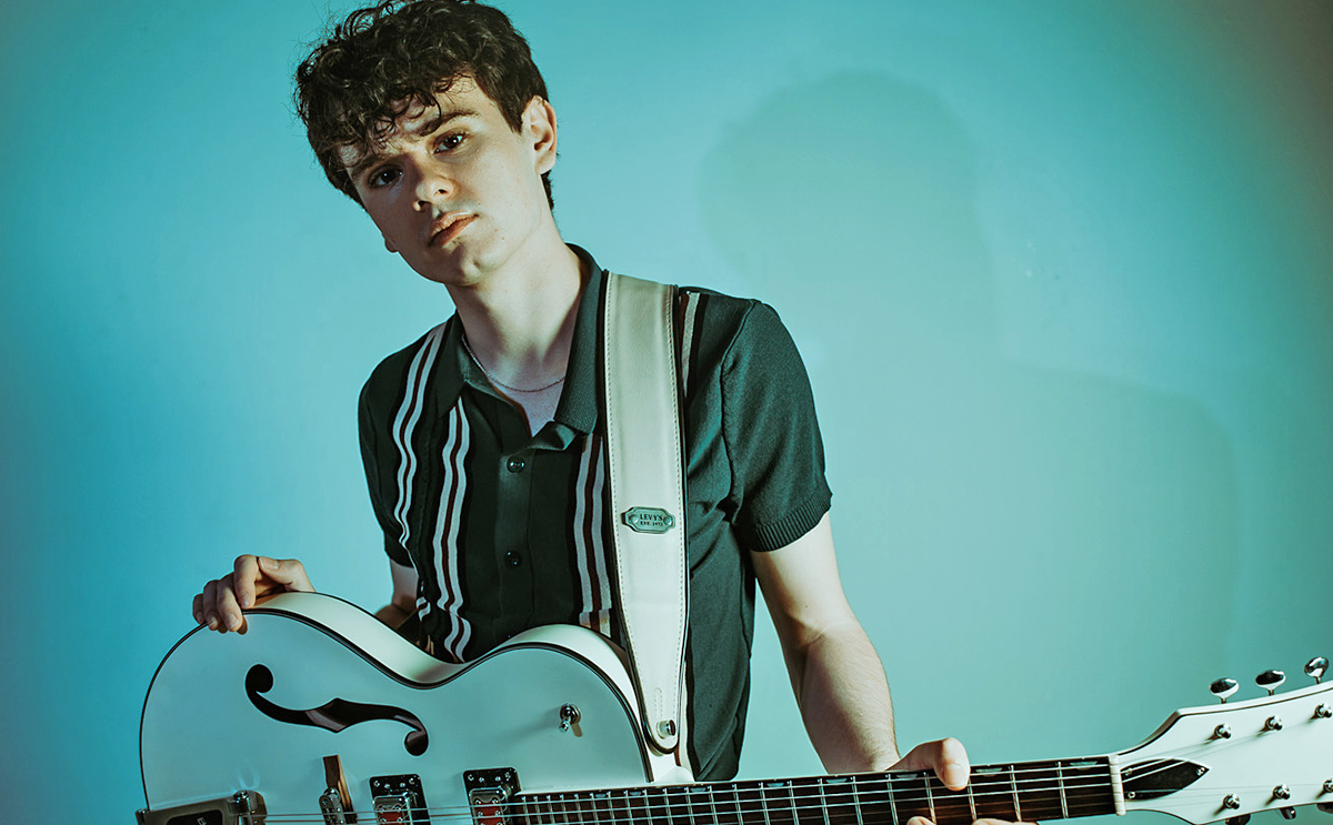 Jack Lutz with guitar