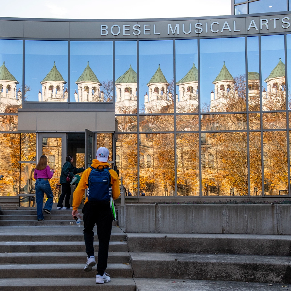 Students on the steps of BMAC in the Conservatory.