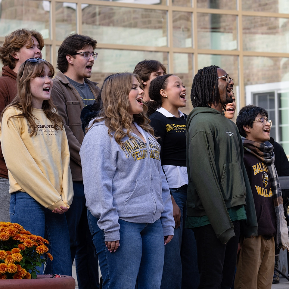 Music theatre students from the BW Conservatory of Perfomring Arts perform on the front steps of Boesel.