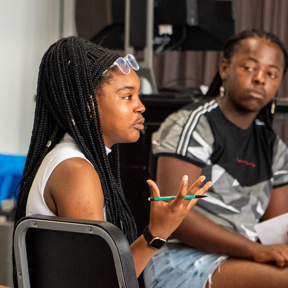 Students in small group discussions in class