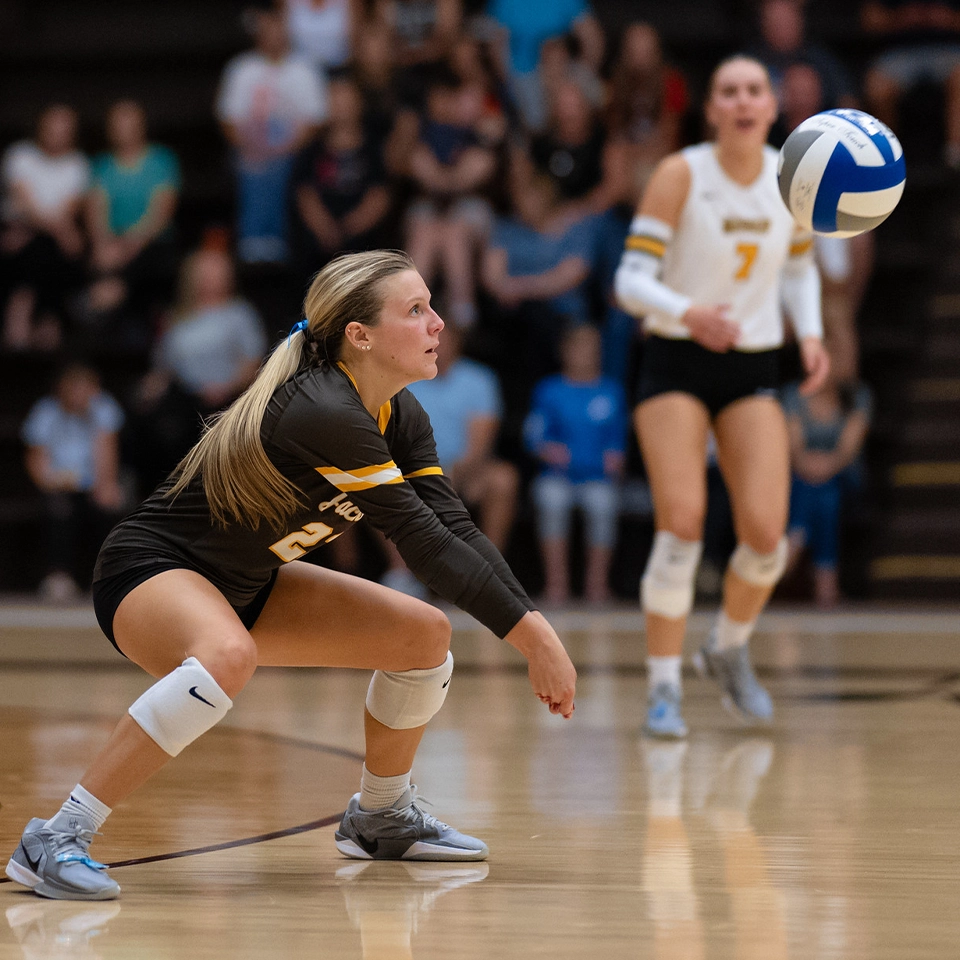 The Yellow Jackets women's volleyball team in action.