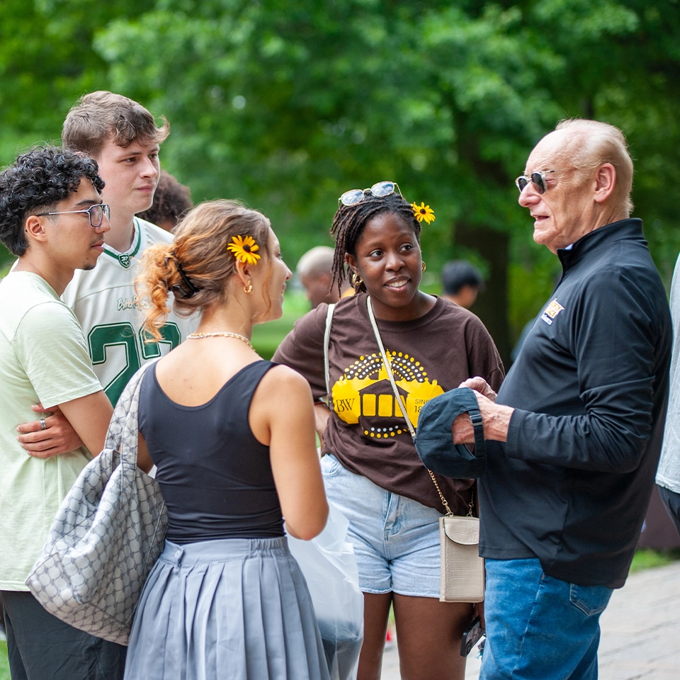 President Lee Fisher checks in with students