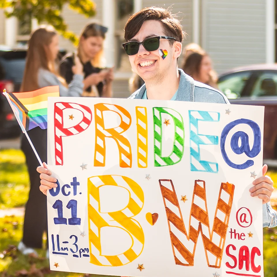 BW student holding a pride sign