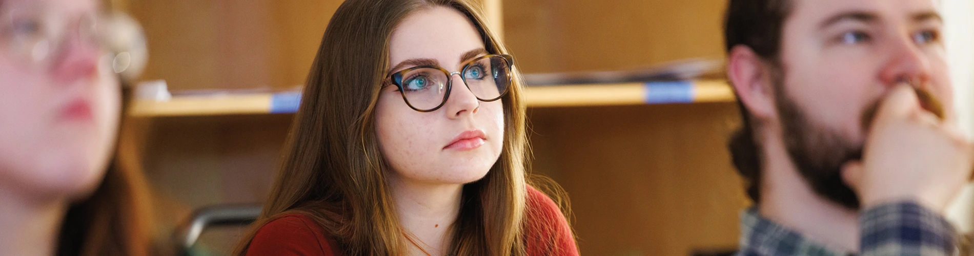 A BW student listening intently and looking interested during a class.