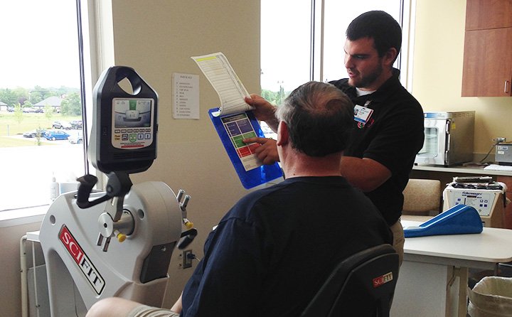 Tyler Shaffer '16 with cardiac rehab patient