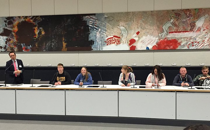 Students participating in BW's Seminar in Germany meet in the German capitol building complex (Reichstagsgebäude) in the plenary meeting room of the Social Democratic Party. 