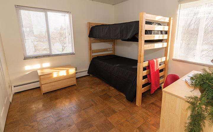 photo of apartment bedroom with beds