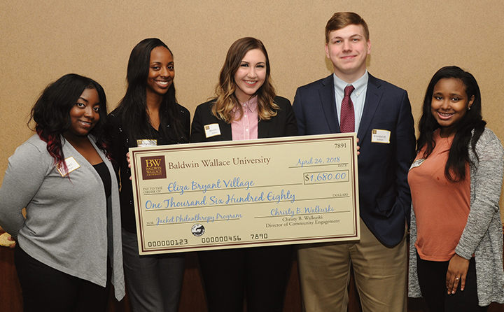 Photo of BW students with award check