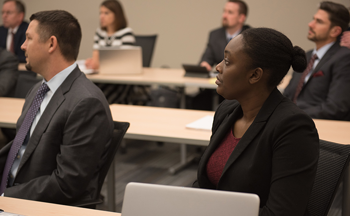 Photo of MBA students listening to a lecture