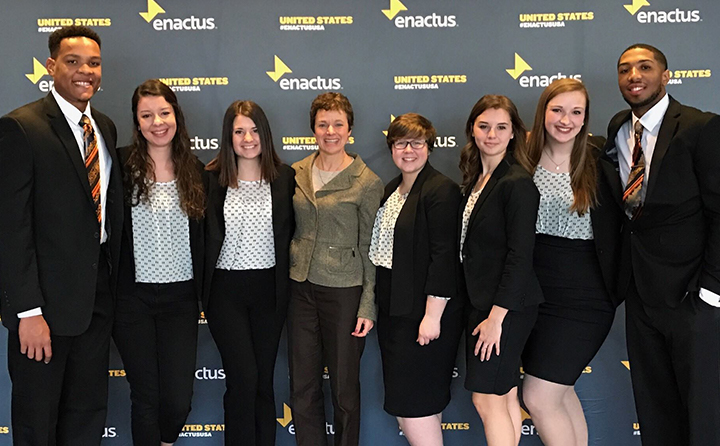 Group photo of students in business attire