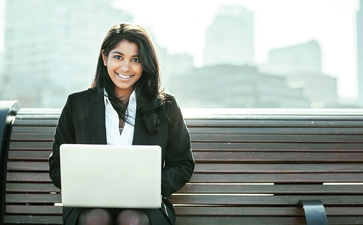 photo of student taking graduate business classes