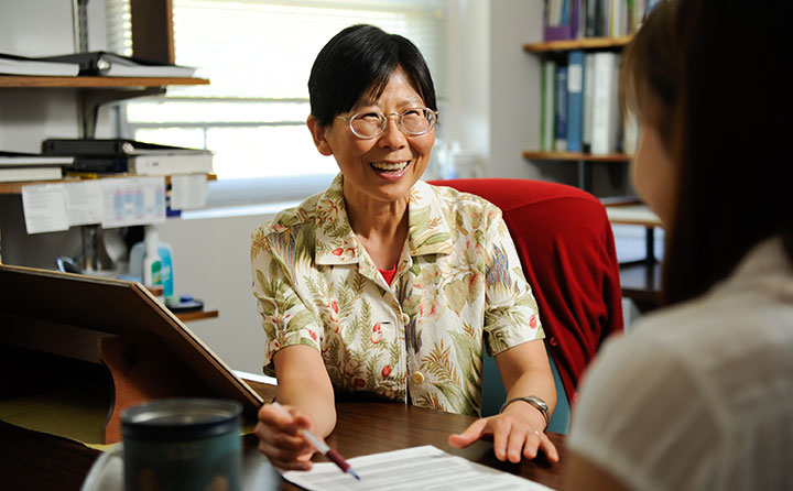 Baldwin Wallace mathematics faculty member, Dr. Chungsim Han, meets with a student