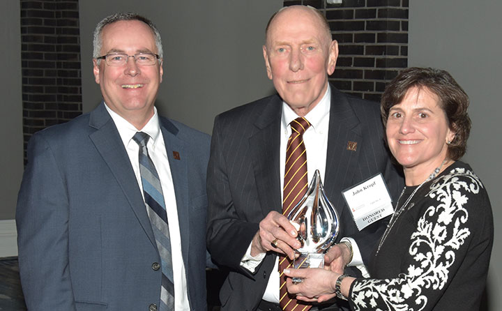 At OFIC's Evening of Excellence, left to right, President Bob Helmer, Trustee John Kropf, and Francie B. Henry, OFIC Board Chair