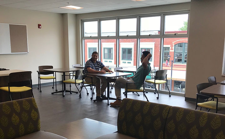 The new Front Street Residence Hall’s common areas feature light-filled gathering spaces overlooking downtown Berea.