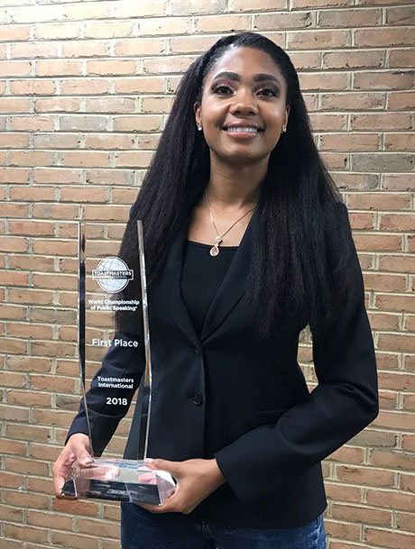 Ramona J. Smith stops by BW with the Toastmasters championship trophy!