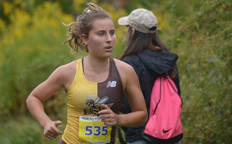 Claire Makowski competes for the Yellow Jacket cross country team
