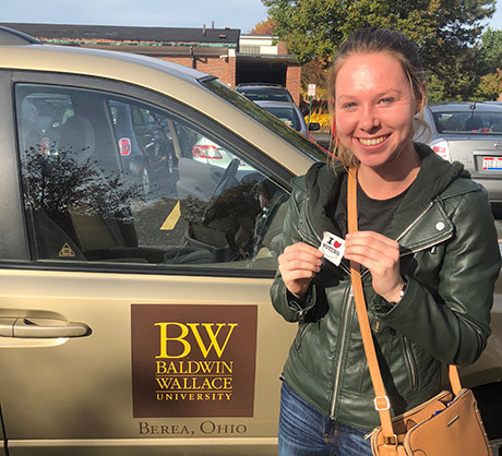 Katie Fowler has already voted, making the trek to the Cuyahoga County Board of Elections to vote early with Ally Crays.