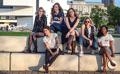 Photo of Alison Tomin '10 (fourth from left) with her fellow front women and the host of "Women Rock CLE"