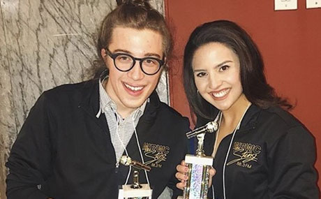 Isaac Luther and Madeline Carter show off their awards