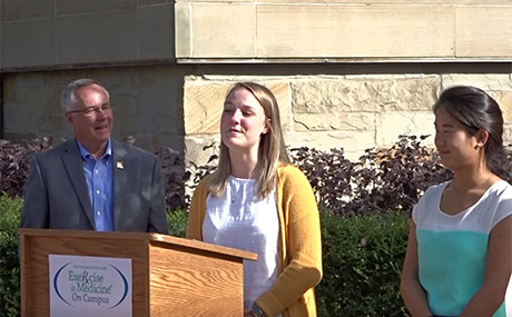 Photo of, left to right, President Helmer, Athena Ridgley '18 and Lily Pattyn '19 at the Presidental Proclamation