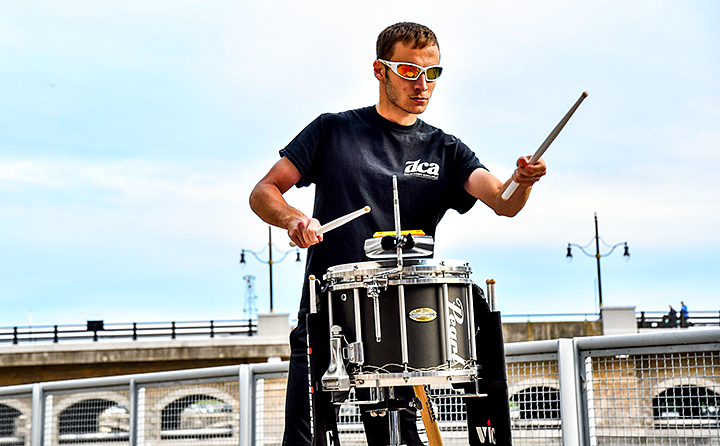Photo of BW student Gabriel MacWilliams playing his snare drum at Drum Corps Associates World Individual & Event Snare solo competition