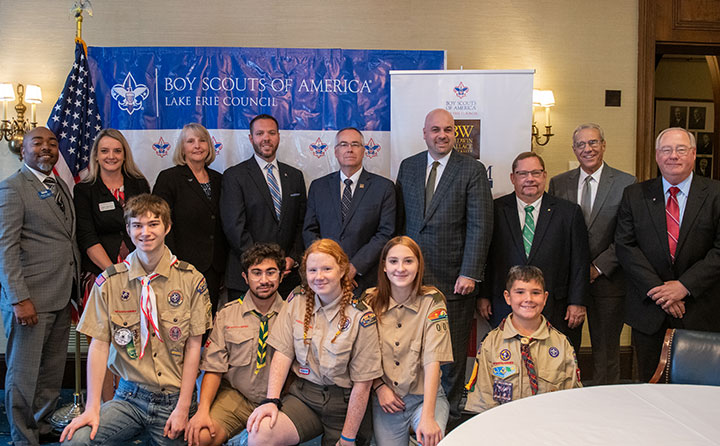 Leadership from area colleges, including BW President Bob Helmer (center back) joined leaders and scouts from the Boy Scouts of America, Lake Erie Council, to announce the BSA college award program.