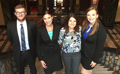 Tyler Cendroski ’17, Allison Thompson ’17, Tessa Louche ’17 and Gwyn Dubel ‘19 at the Union Club in downtown Cleveland where they presented to their client, a professional networking organization for international business executives.