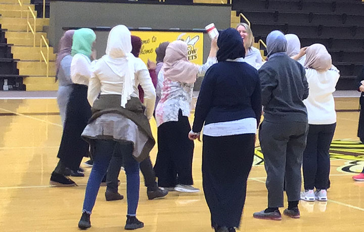 A delegation of Saudi women get hands-on practice teaching physical education to girls at BW.