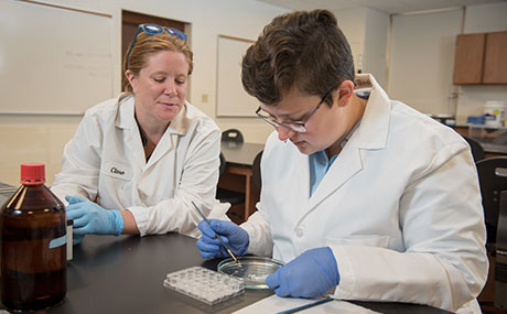 Photo of Delenn Hartswick '21 and Dr. Clare Mathes