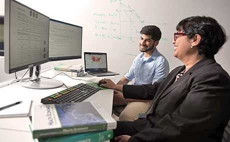 Photo of Yash Kahai '20 and Dr. Herman Sahni