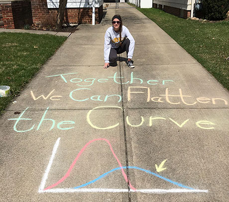 Public Health major Mallory Walsh used social media and sidewalk chalk to encourage social distancing as part of the “National Active Citizen Challenge.”