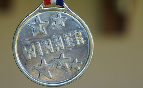 A medal etched "winner"