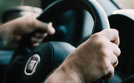 Hands on steering wheel