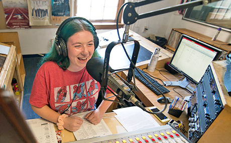 photo of a student on-air with WBWC radio station
