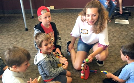 BW education major Kelly DeGross ’21, who will graduate in December, works with summer campers.