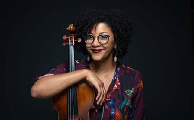 Ashleigh Gordon holding her viola