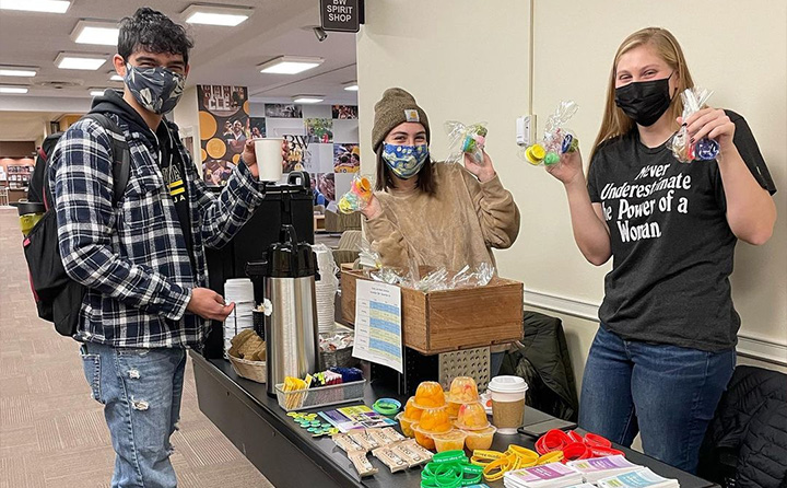 BW Active Minds chapter president Emily Muench and former VP Morgan Ashley table in the union for "Stress Less Week."