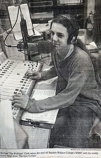 Clark's time as music director of WBWC The Sting radio inspired his future career path. Clark (aka "The Wolfman") is seen here in the campus studio for a 1995 feature photo that appeared in The Plain Dealer.